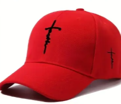 Red cap with black designs on a white background